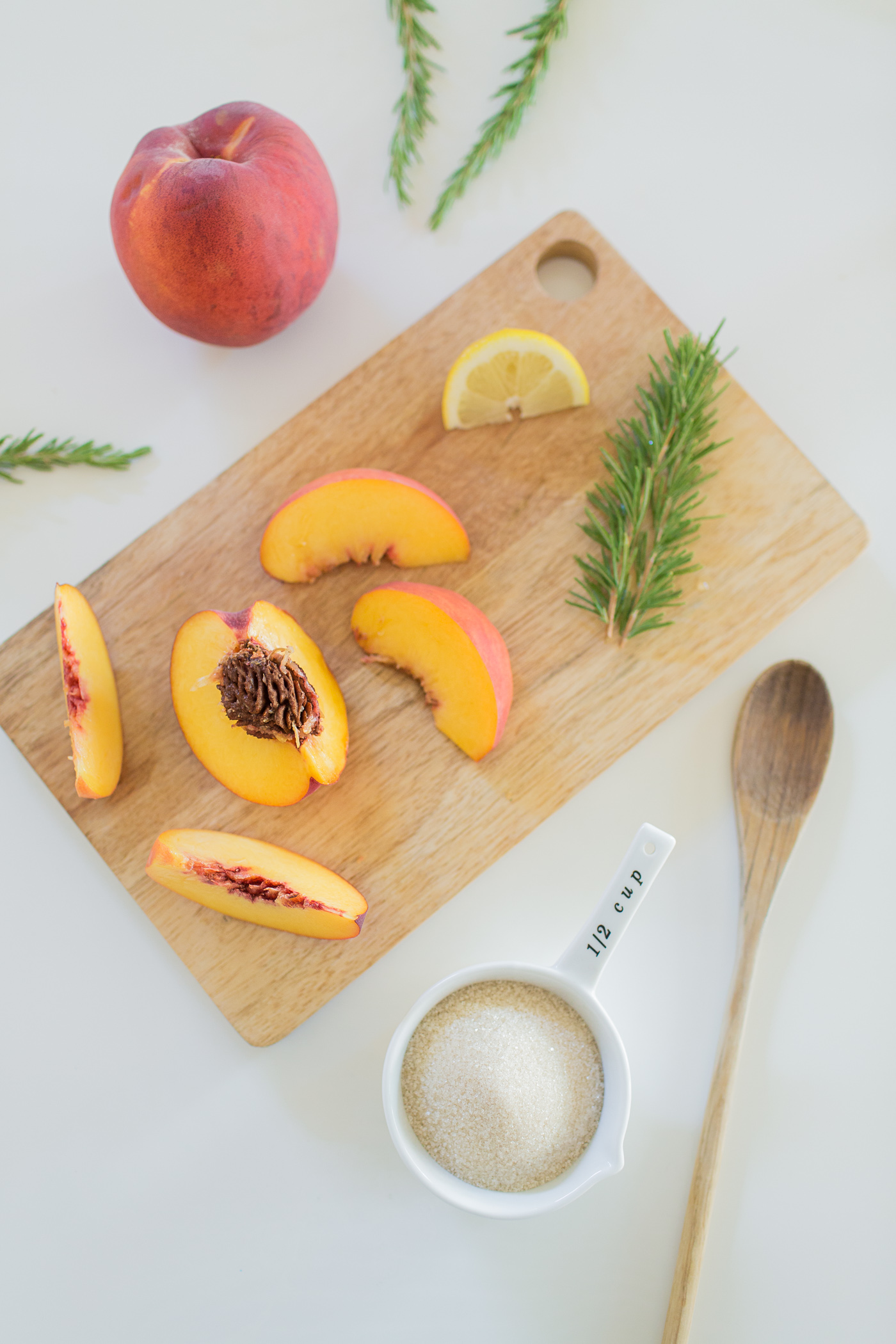 Rosemary Peach Jam. Fresh peaches, rosemary, and lemon are some of the ingredients.