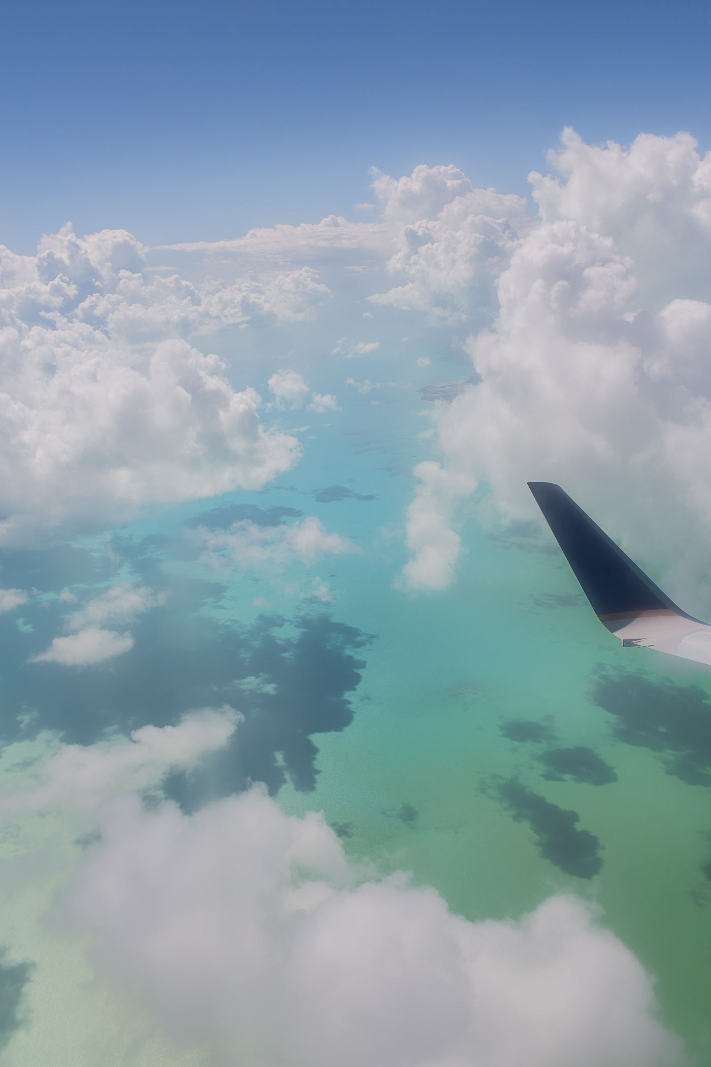Overwing shot over Turks and Caicos islands. Beautiful water!
