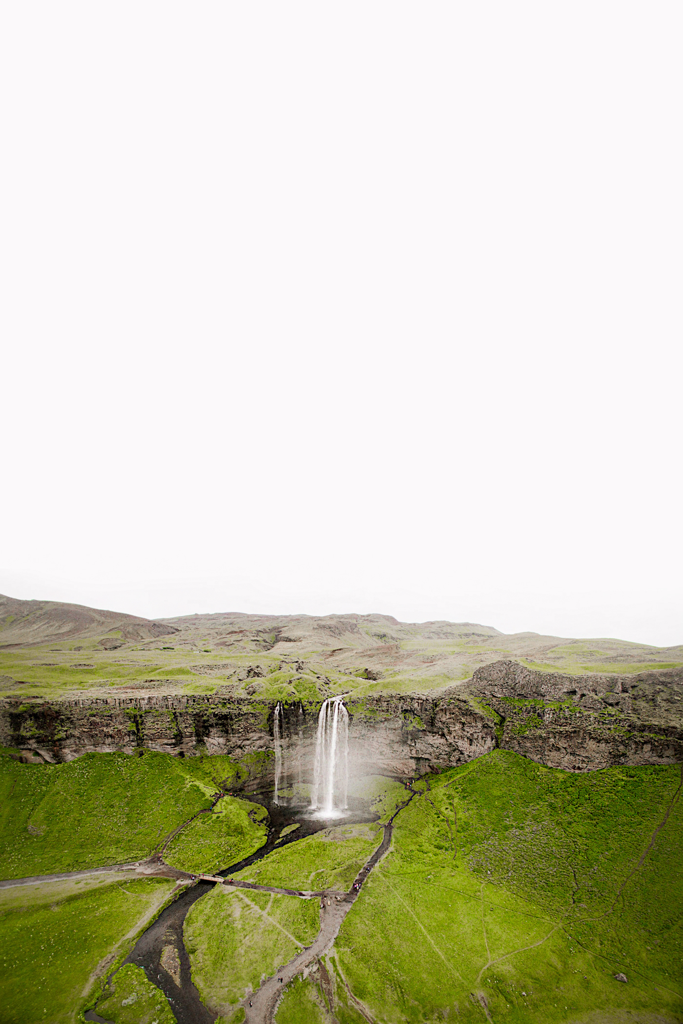 Seljalandsfoss Waterfall in Iceland. Has a trail that leads behind the waterfall!