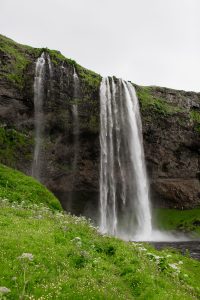 Seljalandsfoss Waterfall in Iceland. Has a trail that leads behind the waterfall!