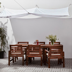 Ikea dyning canopy in white, as seen in a modern tropical outdoor space