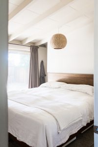 A modern and minimal bohemian bedroom.